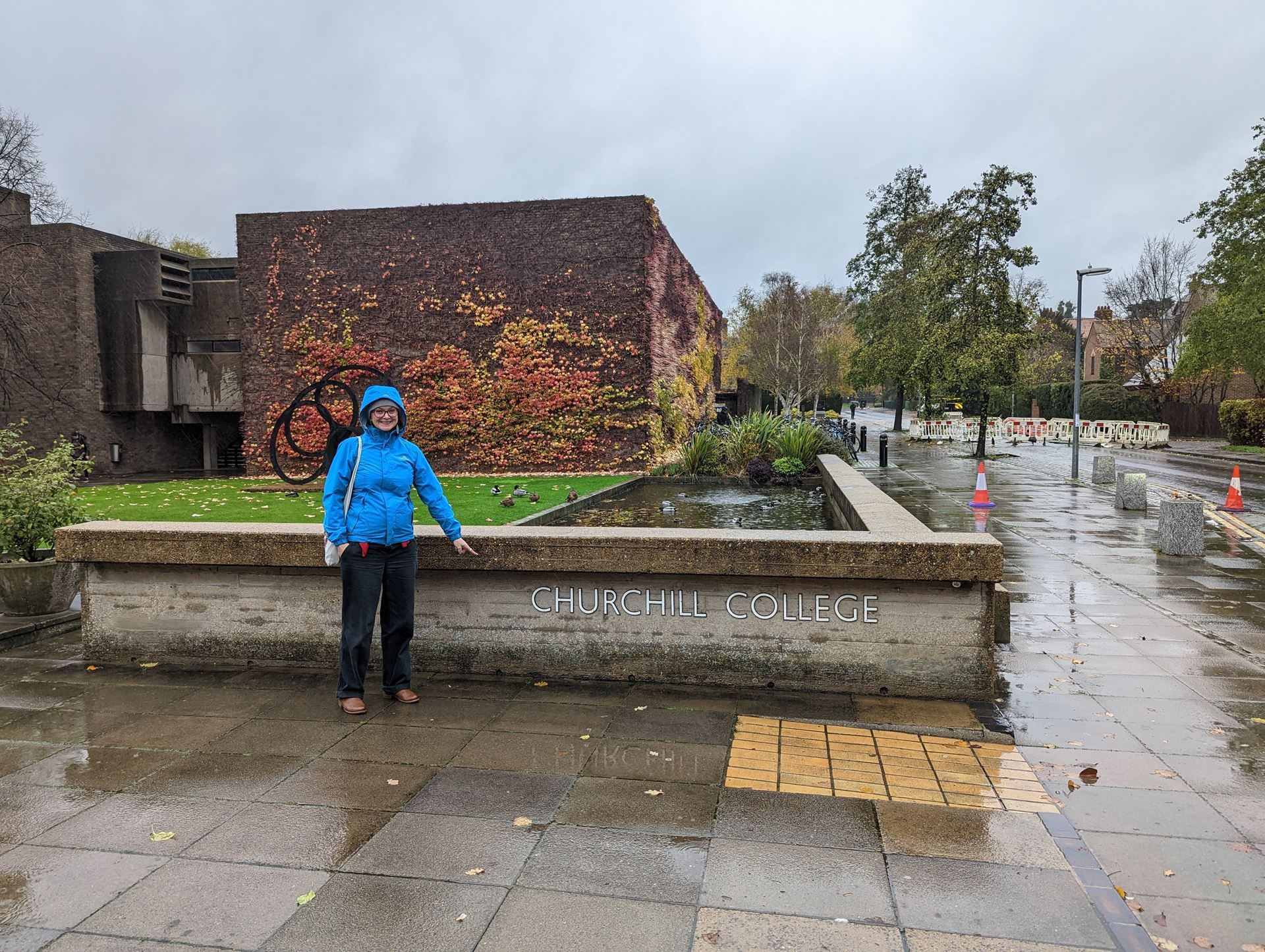Pictured: Karen Lamb enjoying the rainy Cambridge weather, Churchill College, University of Cambridge, Cambridge, November 2022 